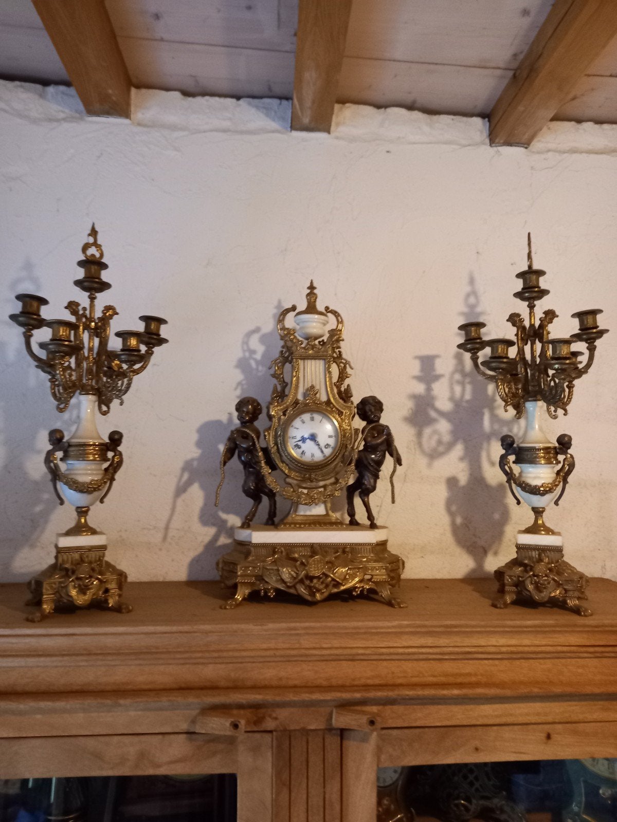 Horloge de cheminée avec chandeliers., Enlèvement