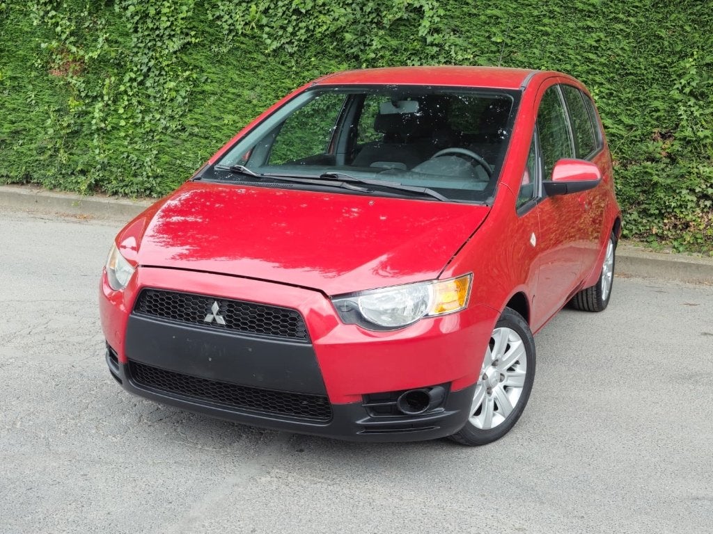 - Mitsubishi colt/2009/71000.km - 1,1I/essence, Autos, Mitsubishi, Rouge, Achat, Entreprise, Boîte manuelle