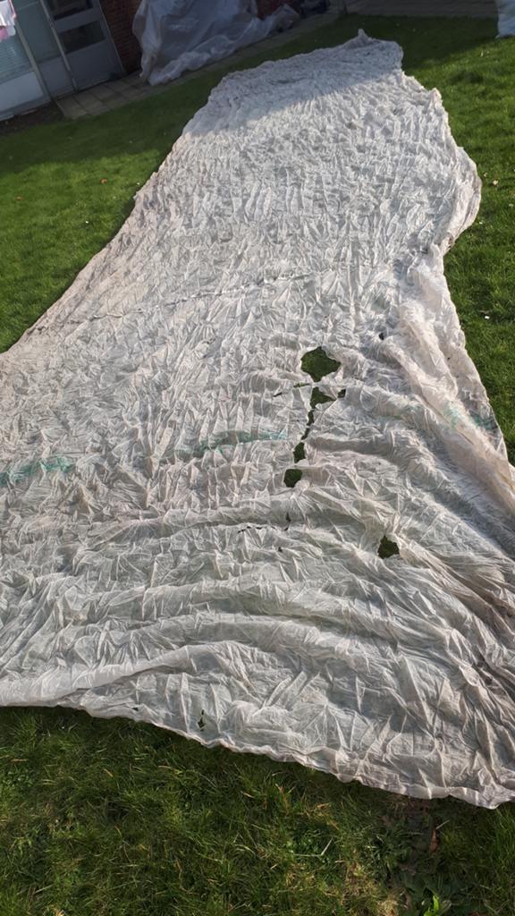 Lichte doek om bv planten af te dekken, Ophalen