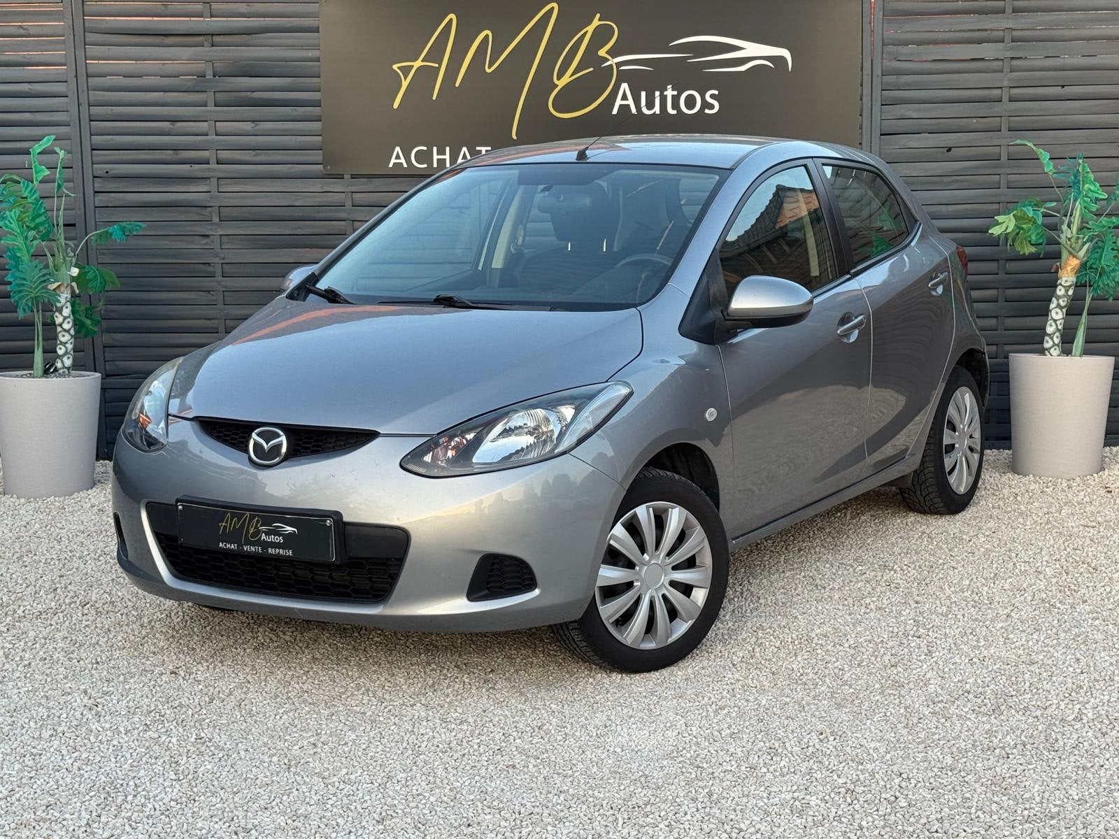 Mazda 2 1.4 Turbo CDVi */*CLIM+CARNET+VELGEN*/*, Stof, 50 kW, Zwart, 4 cilinders