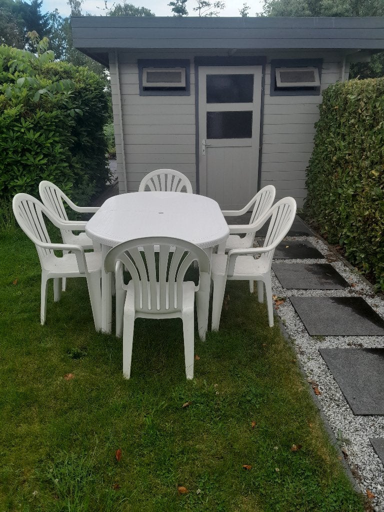 Tuintafel met zes stoelen  en kussens, Tuin en Terras, Tuintafels, Gebruikt, Ovaal, Kunststof, Ophalen