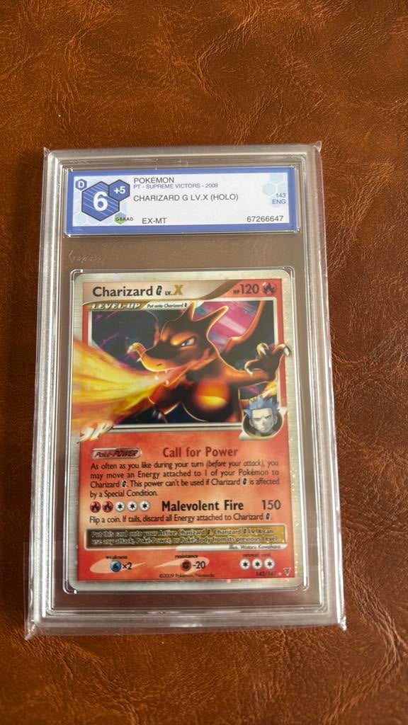 Pokémon Charizard G LV.X 143/147 supreme victors 2009 holo, Hobby en Vrije tijd, Verzamelkaartspellen | Pokémon, Ophalen, Zo goed als nieuw
