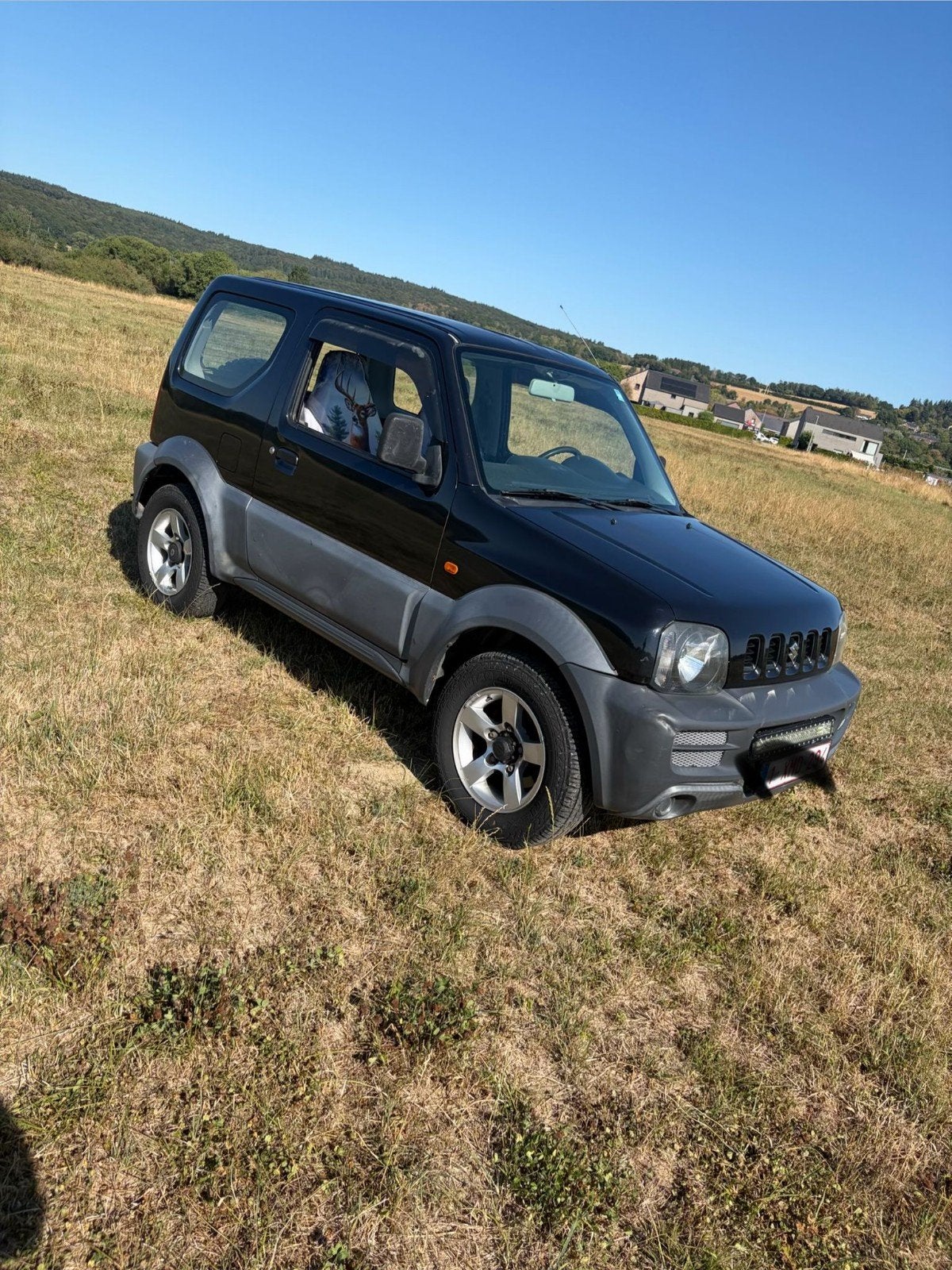 Suzuki Jimny 4x4 1300 benzine jaar 2007 172000km, Auto's, Suzuki, Zwart, 62 kW, Handgeschakeld, Vierwielaandrijving