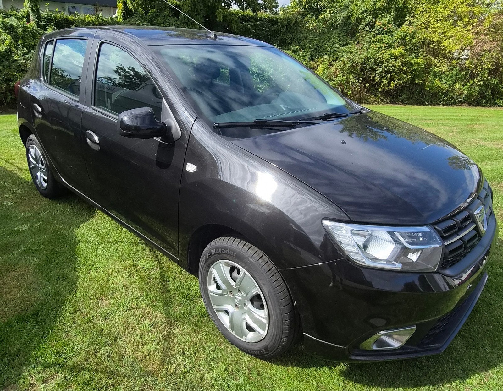 Dacia Sandero 1.0 TCe Comfort Airco 12m garantie, Auto's, Voorwielaandrijving, Dealer onderhouden, Stof, Zwart