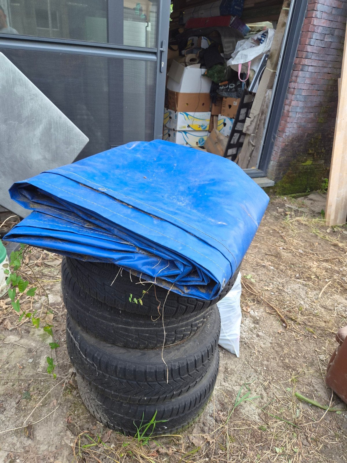 Containerschepen zeil voor bv dak renovatie, Ophalen, Zeil