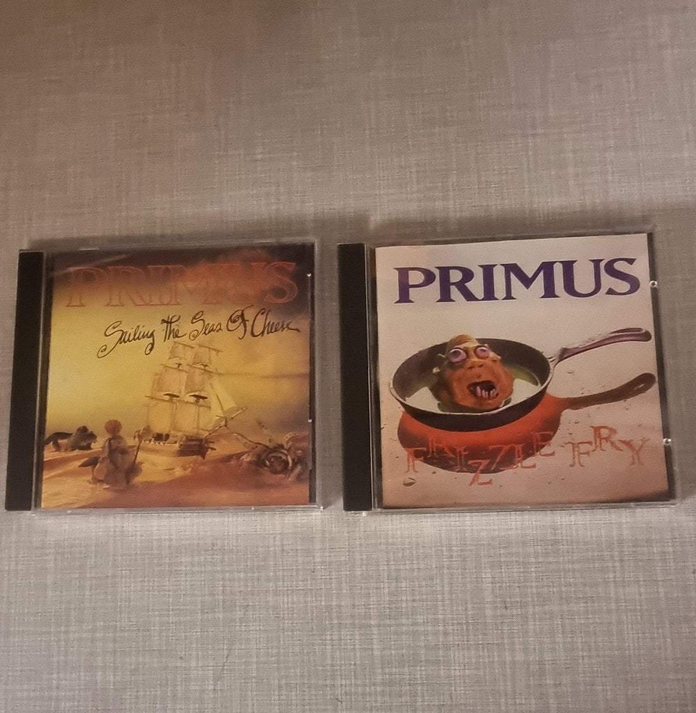 CD de Primus à vendre – Très bon état, Enlèvement ou Envoi, Comme neuf, Funk, Comprend un livret
