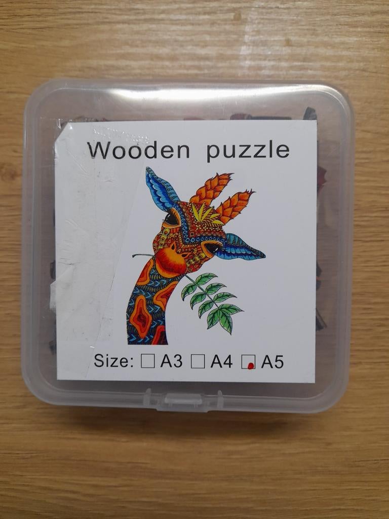 Houten puzzel giraf, Ophalen