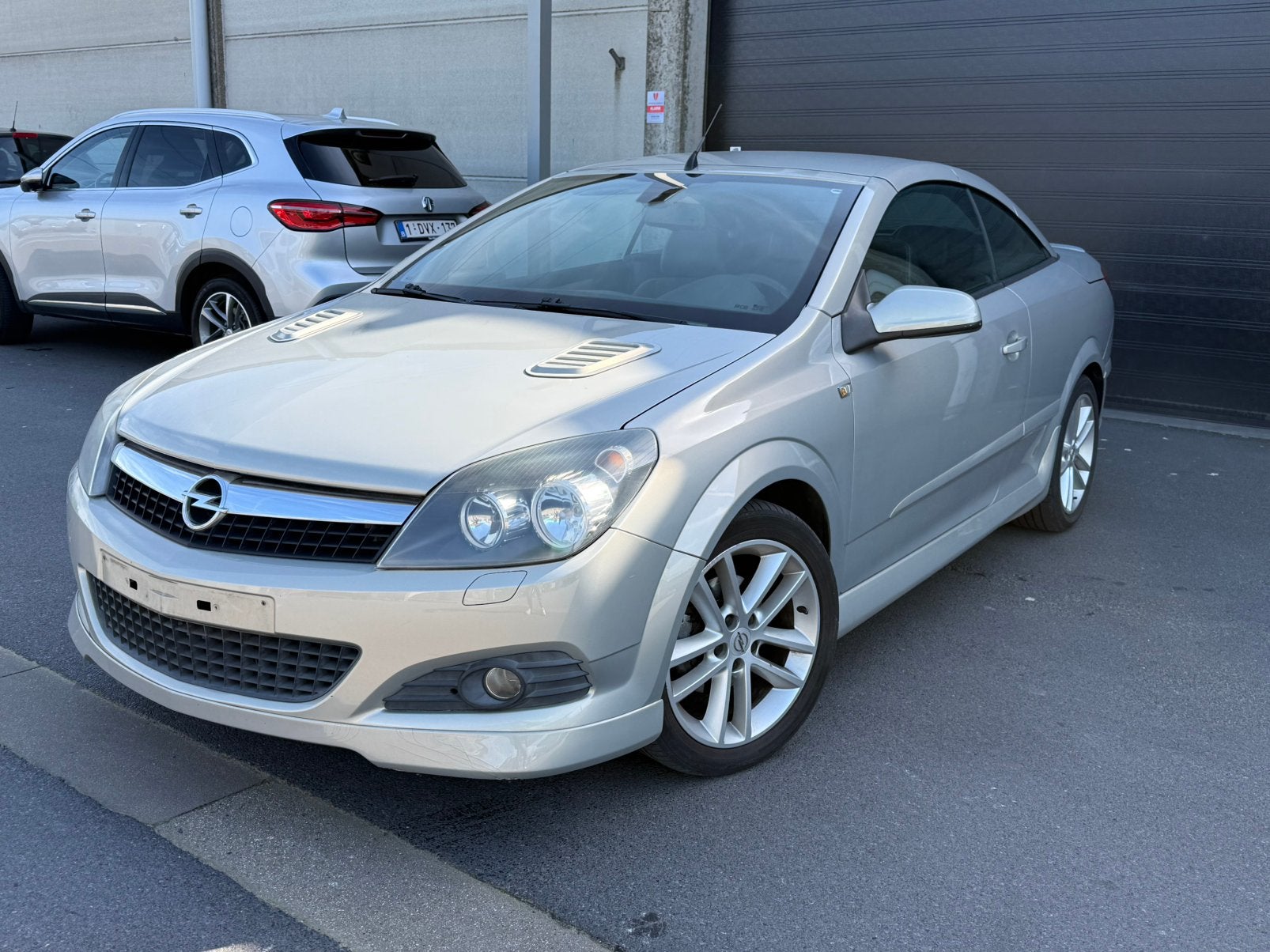 Opel Astra 1.6 benzine Cabrio, Auto's, Zwart, Cabriolet, Leder, Bedrijf