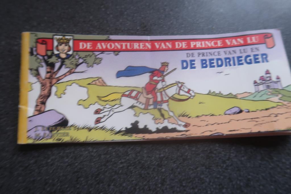 strip de prince van Lu en de bedrieger, Boeken, Stripverhalen, Zo goed als nieuw, Eén stripboek, Ophalen of Verzenden