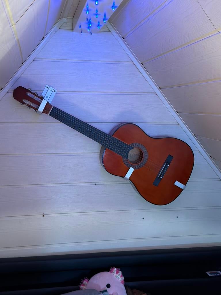 Gitaar, Ophalen, Zo goed als nieuw
