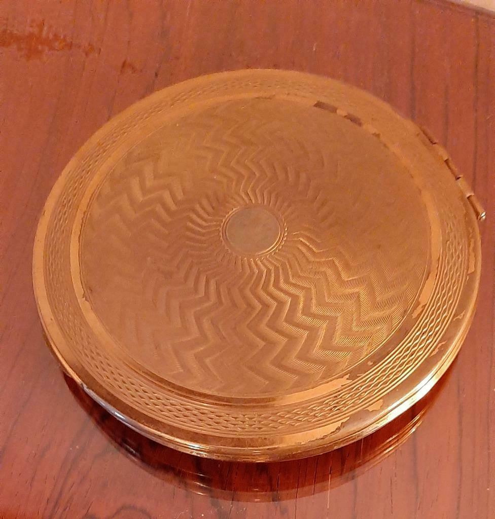 Poudrier ancien doré, Enlèvement, Utilisé