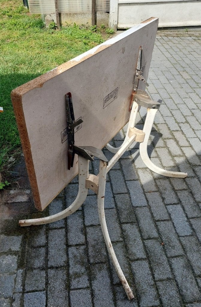 inklap tafeltje, Ophalen