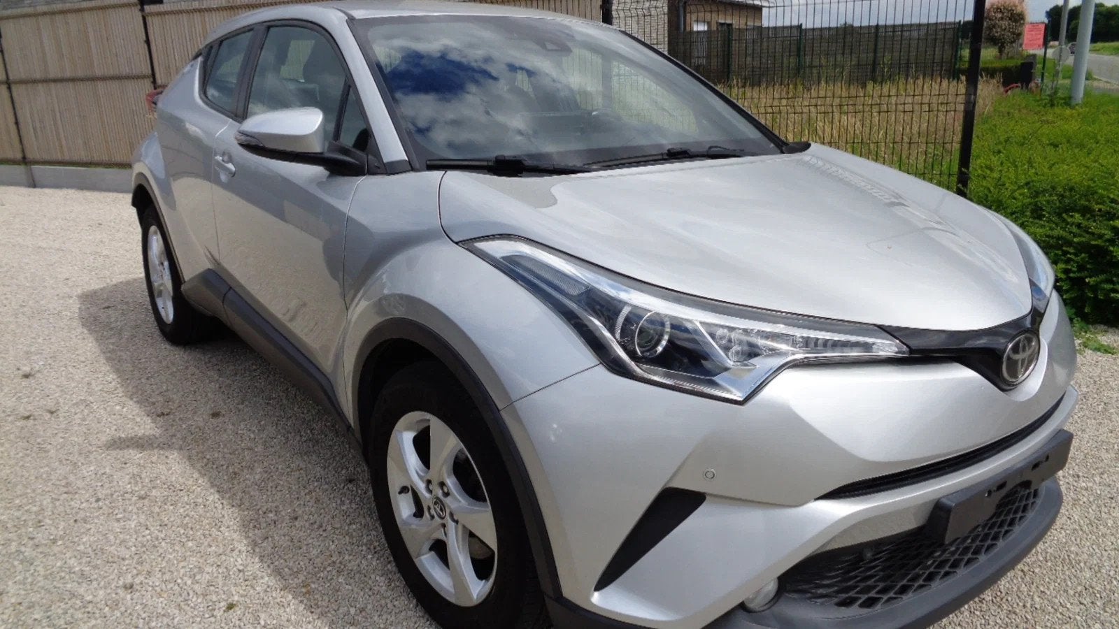 Toyota C-HR ENTER 1.2 Turbo (bj 2018), Auto's, Stof, Gebruikt, 4 cilinders, 116 pk