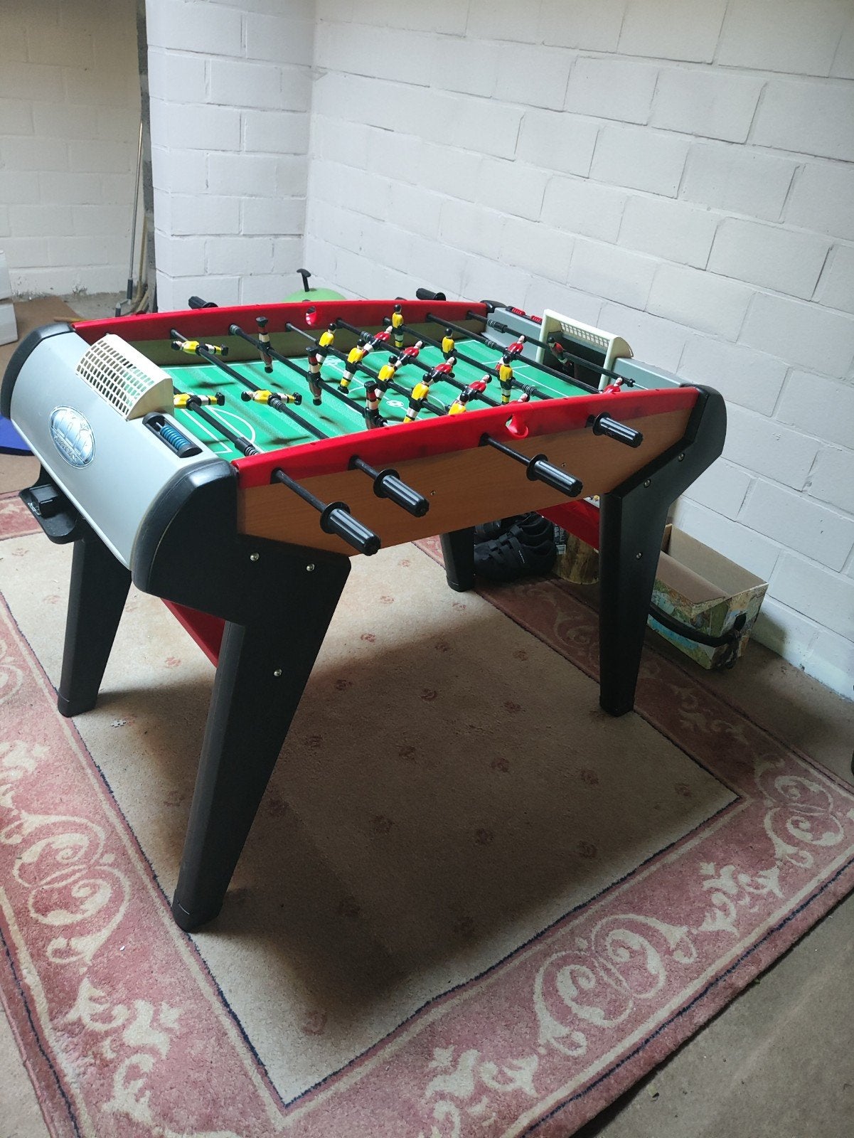 Tafelvoetbal, Ophalen