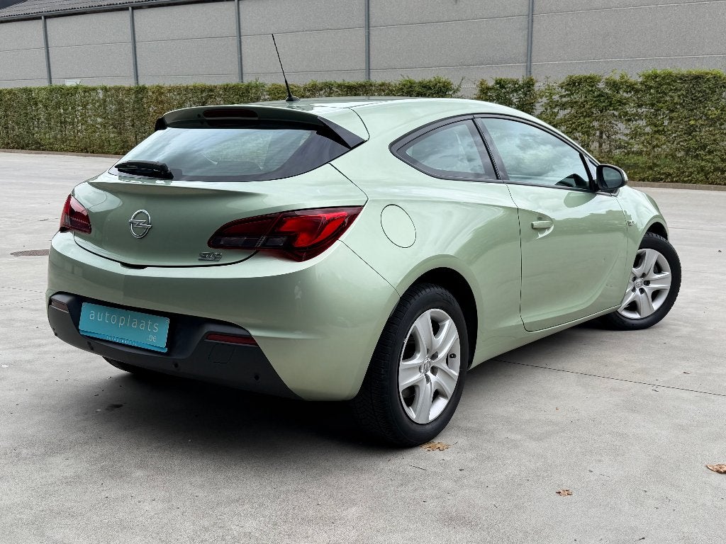 Opel Astra GTC 1.4 Turbo benzine Airco Parkeersensoren, Auto's, Parkeerassistent, Zwart, Bedrijf, Handgeschakeld