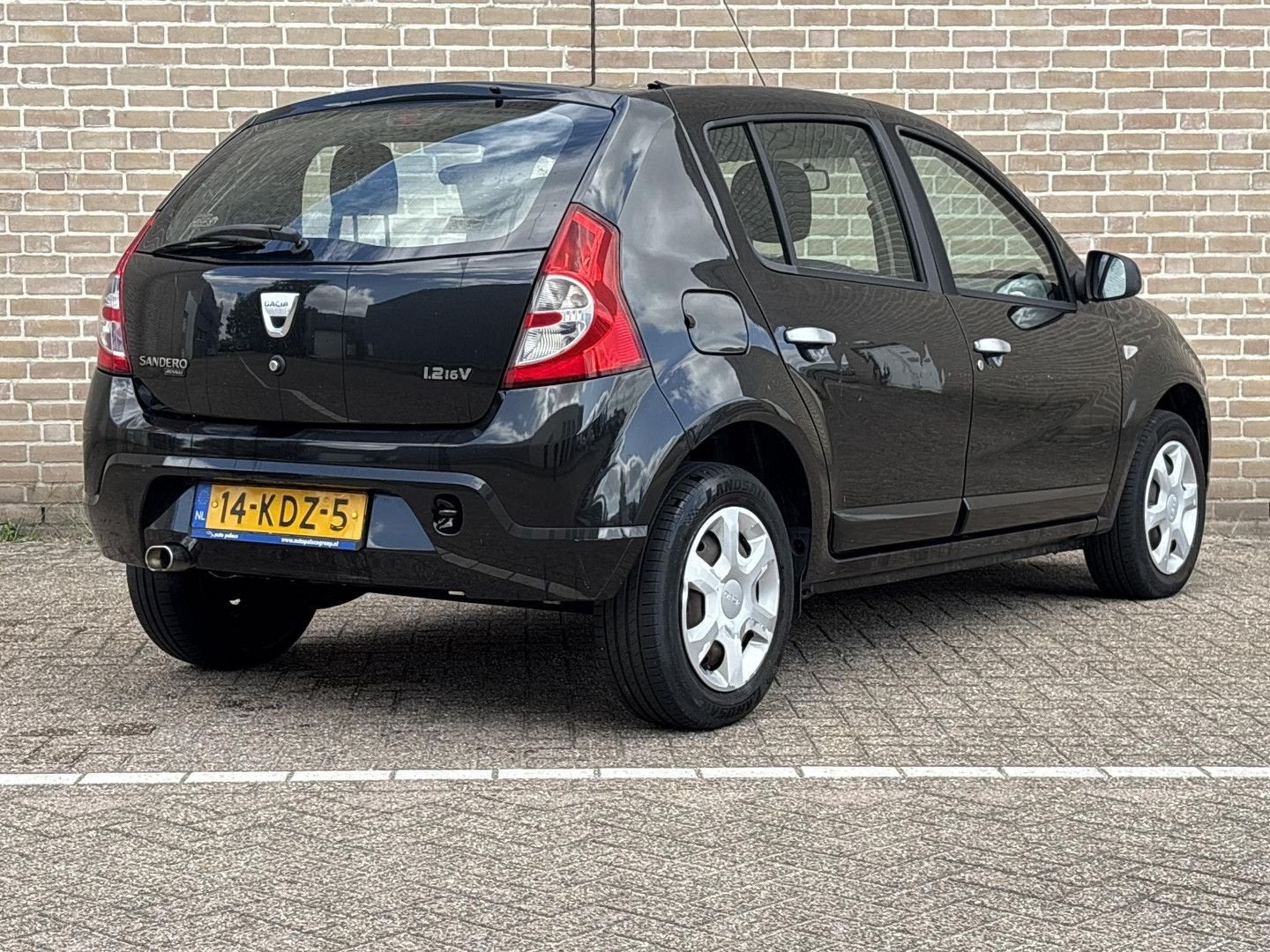 Dacia Sandero 1.2 Lauréate, Auto's, Dacia, 139 g/km, Zwart, Elektrische ramen, Bedrijf