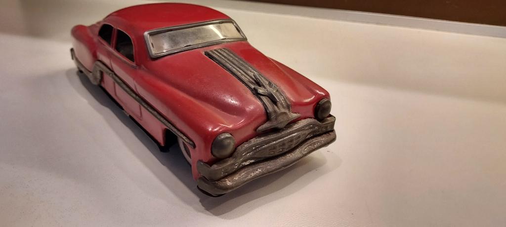 uitverkoop oude speelgoedauto Pontiac rood, nu 14 euro, Envoi