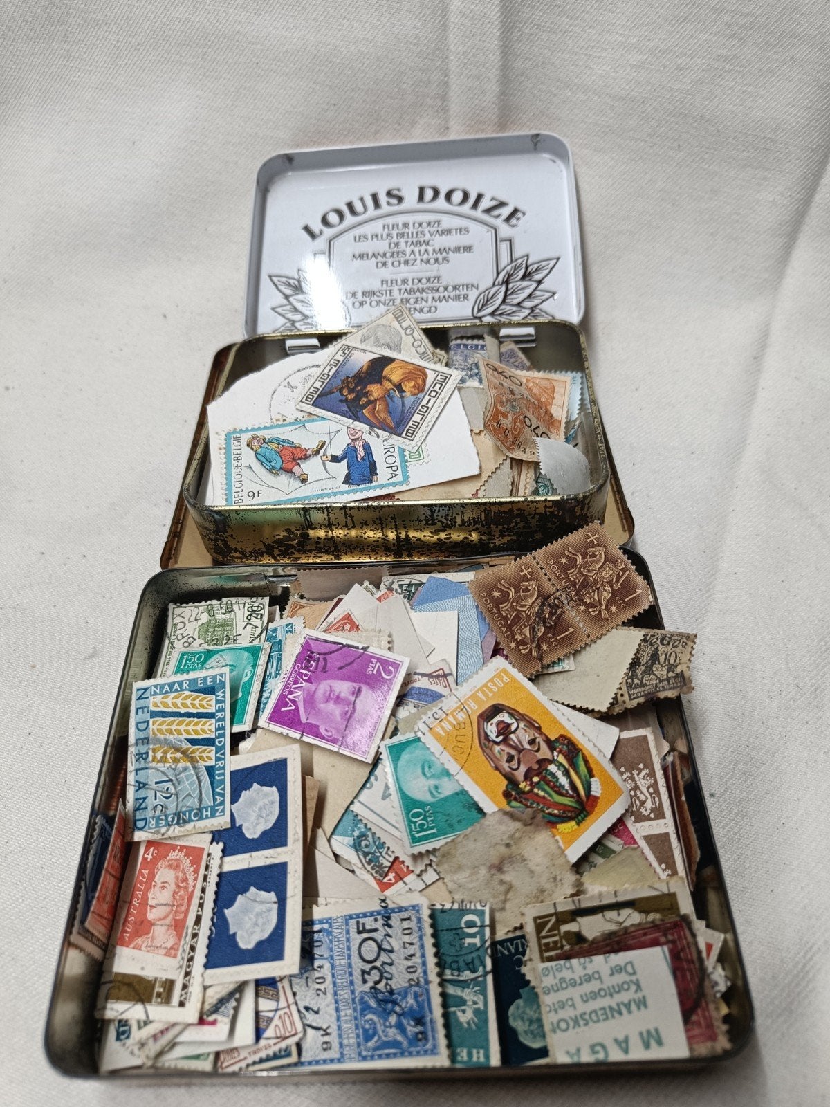 2 doosjes postzegels, Ophalen