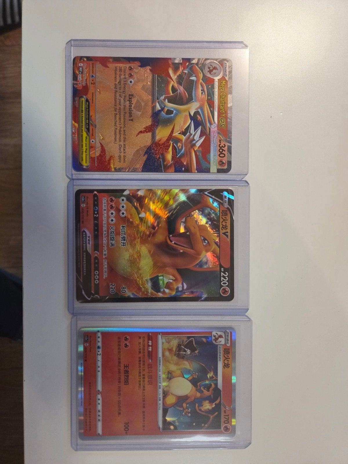 3 kaarten Charizard, Hobby en Vrije tijd, Verzamelkaartspellen | Yu-gi-Oh!, Ophalen, Nieuw
