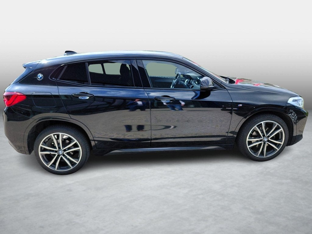 BMW X2 sDrive18i M-Pakket 100kW DCT, Auto's, Gebruikt, Zwart, Zwart, Bedrijf