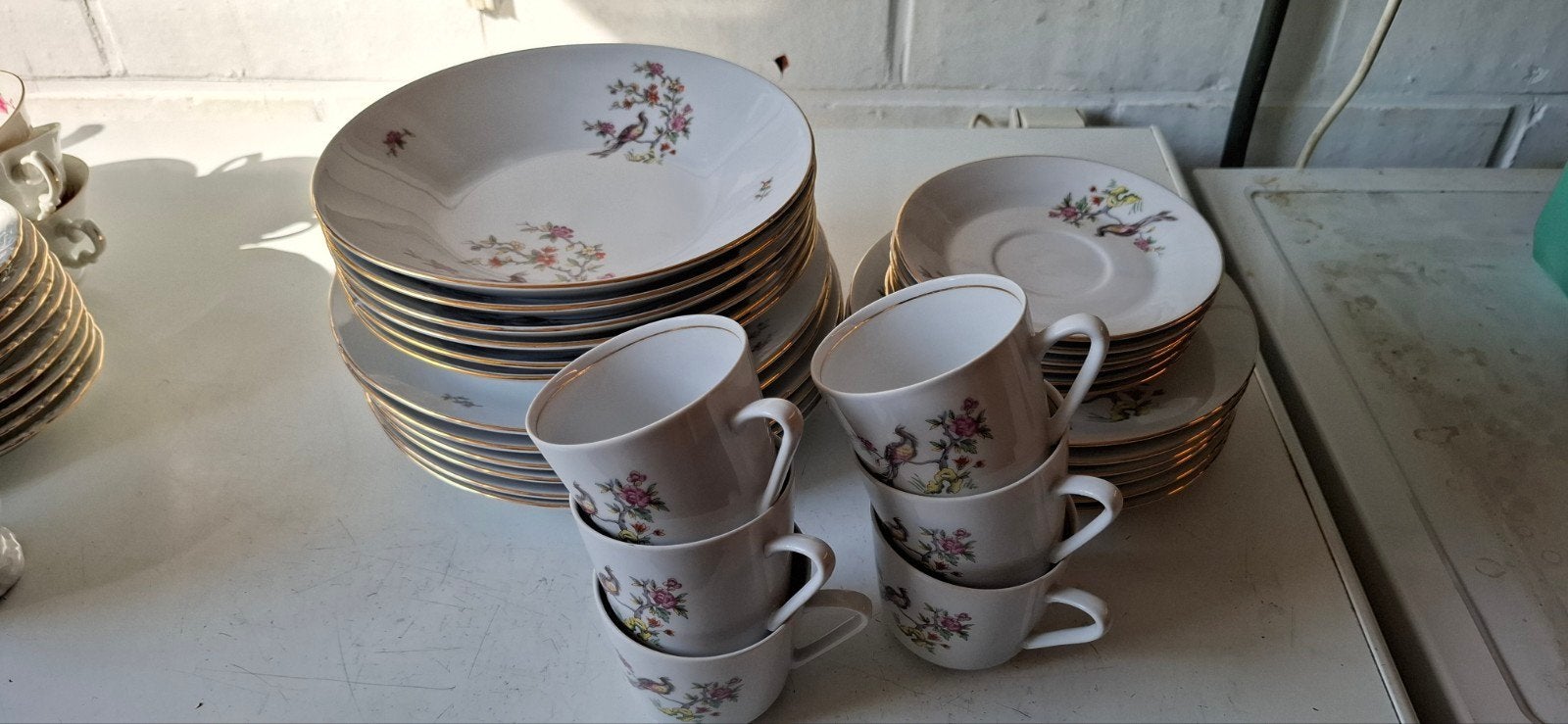 6 delig koffie en eetservies, Ophalen