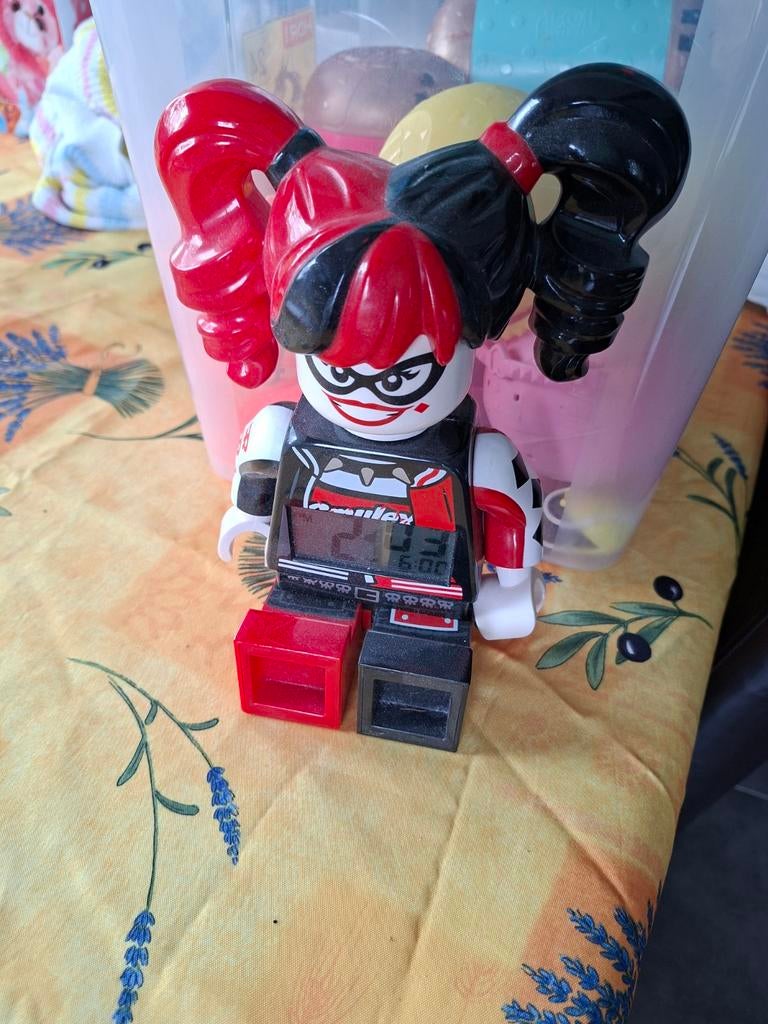 Lego klokwekker, Ophalen