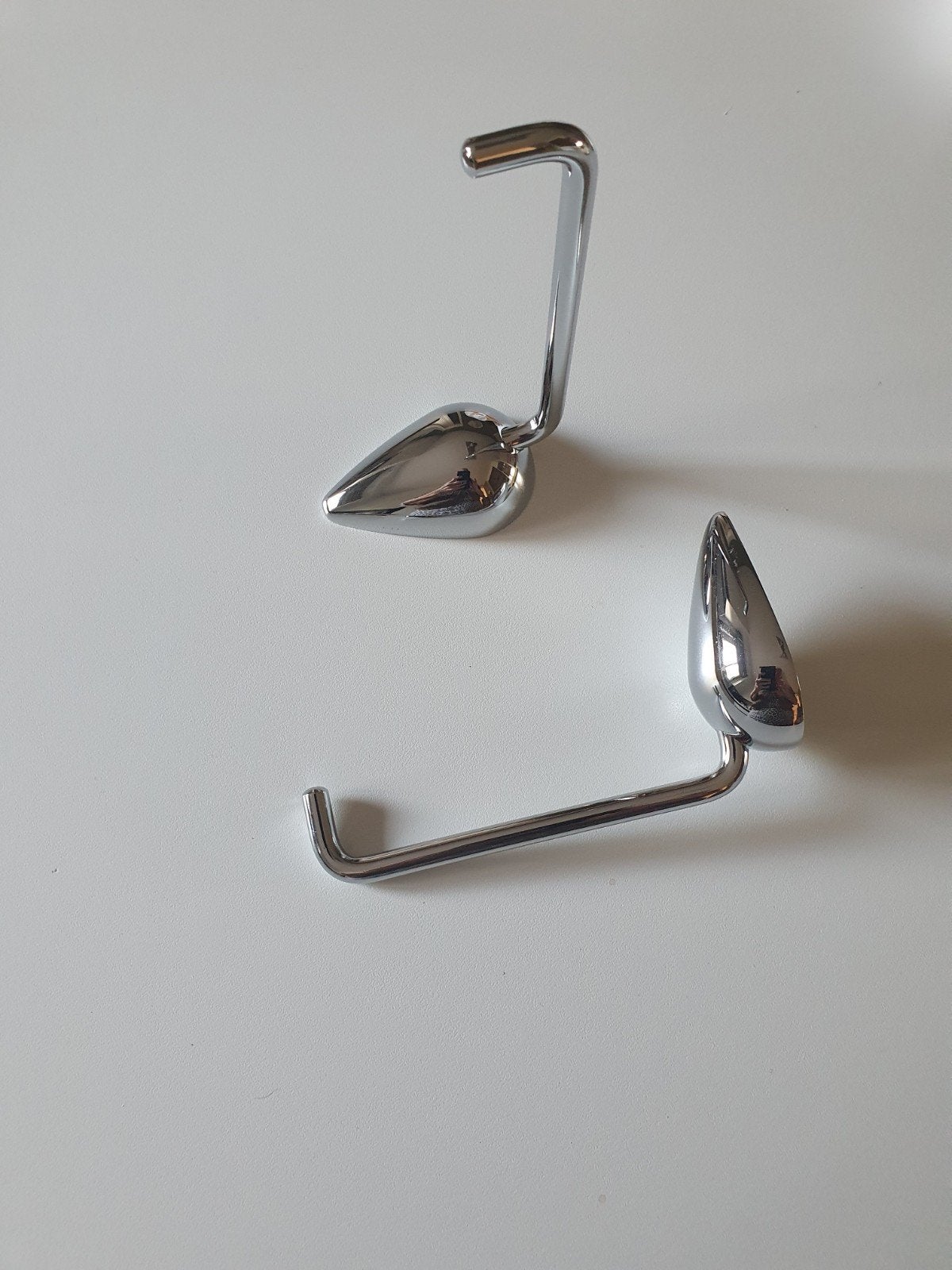 Ophanghaken voor wandschap, Ophalen
