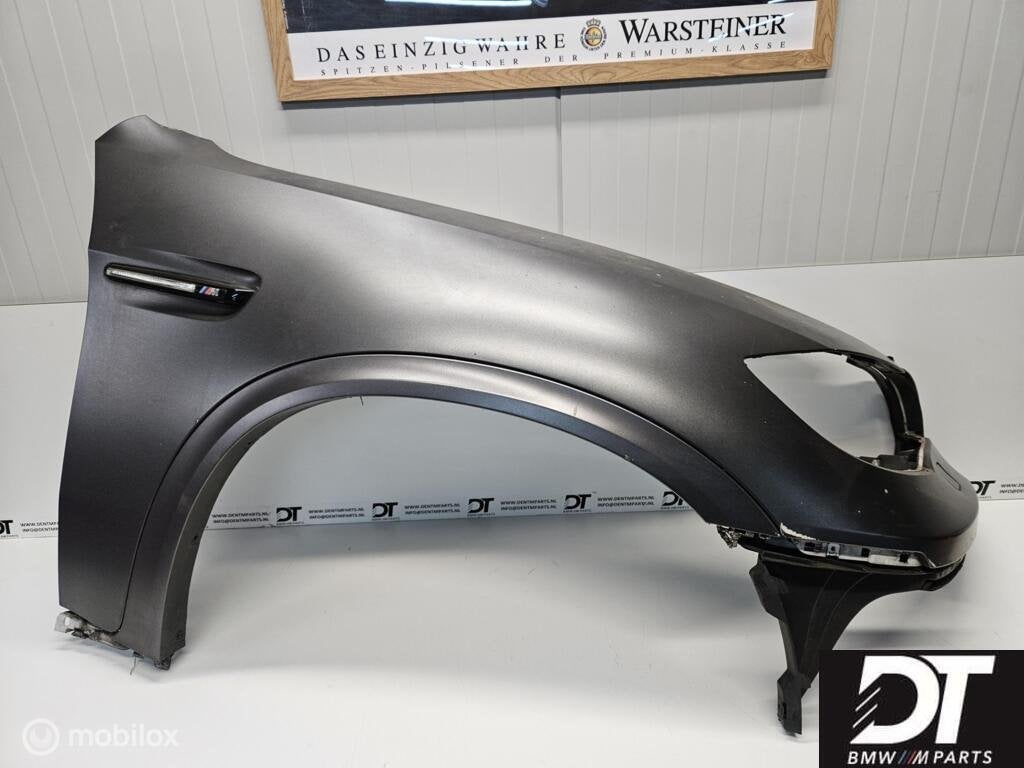 Spatbord rechts BMW X5M E70 S63 V8 S63B44A 51657238598, Gebruikt, Ophalen of Verzenden, BMW, BMW