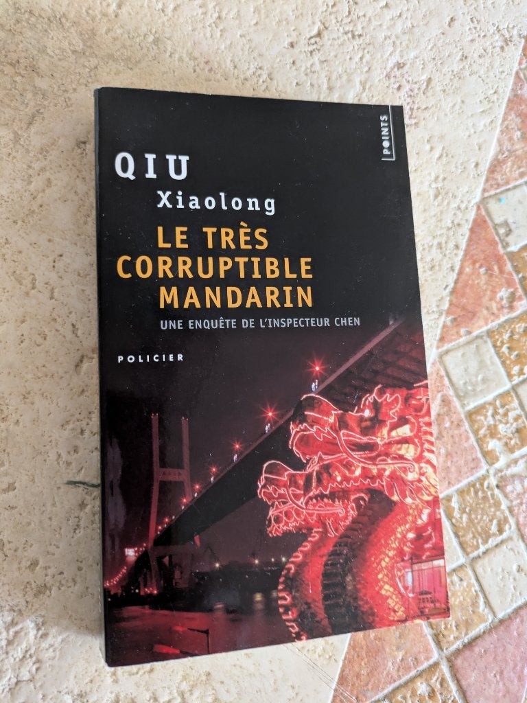 Le très corruptible mandarin (Qiu Xiaolong)., Envoi, Comme neuf, Qiu Xiaolong.