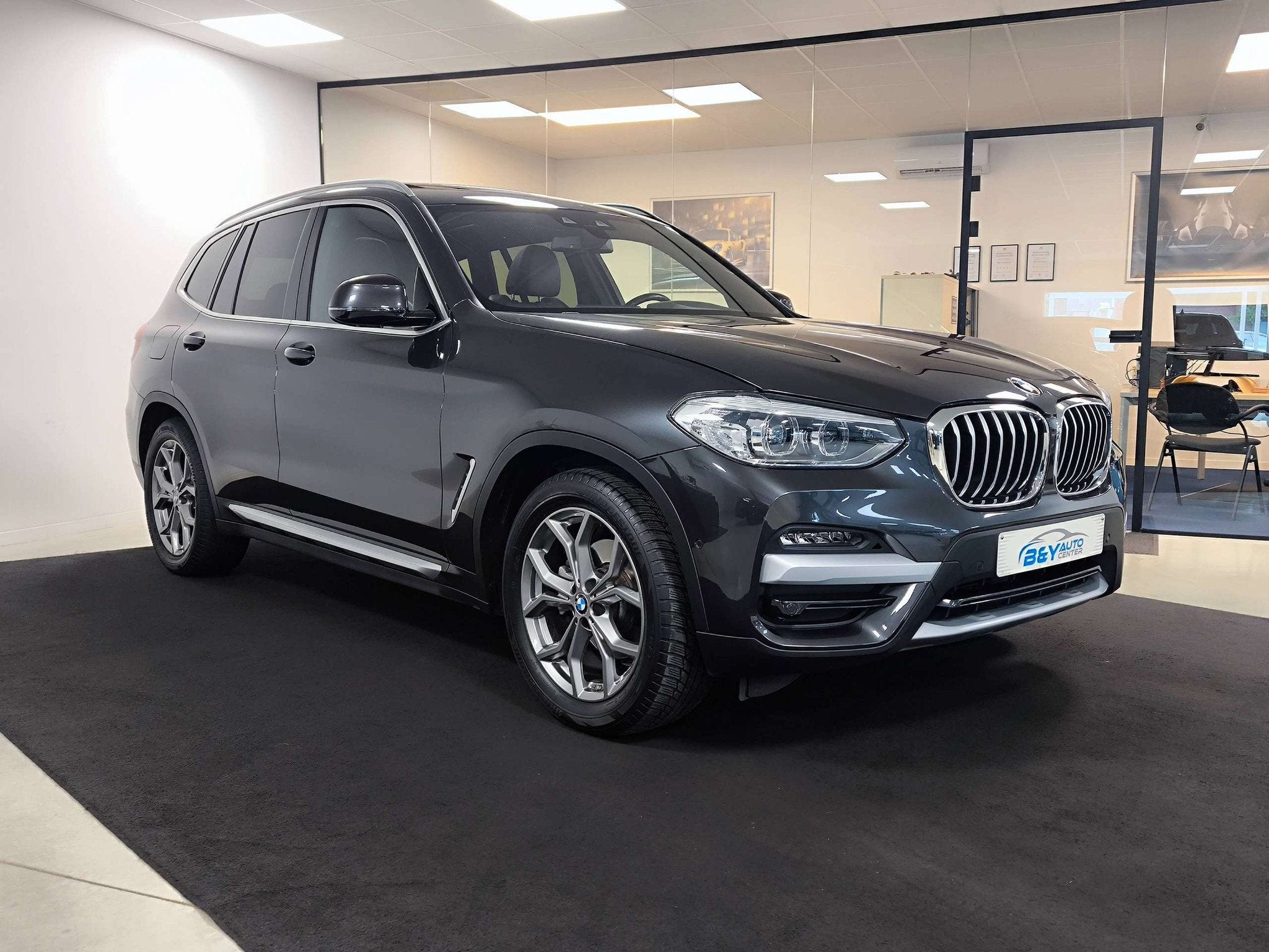 BMW X3 2.0 dA X-line Pakket / PanoDak (bj 2020, automaat), Lichtsensor, 4 cilinders, Bruin, Leder