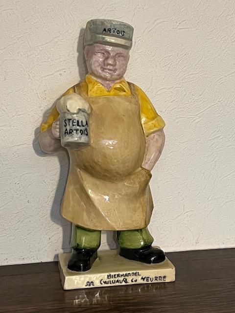 Figurine  céramique Stella Artois brasseur Cailliau à Veurne, Enlèvement