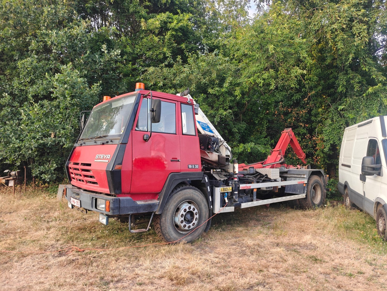 Steyr 19 S 32 — containersysteem + Effer kraan | automaat, Achterwielaandrijving, Zwart, Leder, Diesel