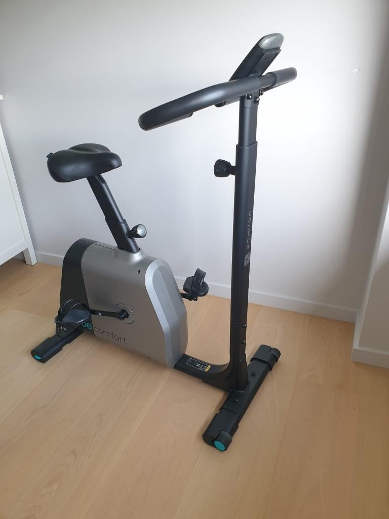 Vélo d'appartement DOMYOS Comfort (résistance motorisée), Sports & Fitness, Appareils de fitness, Comme neuf, Vélo d'appartement