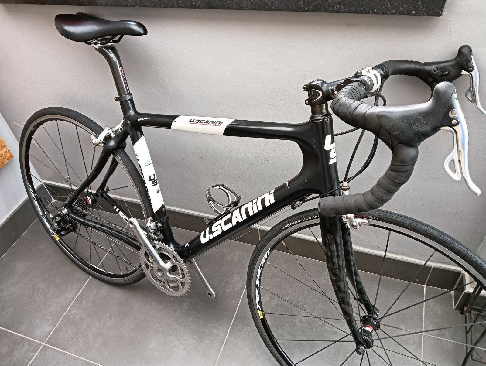 Carbon koersfiets, Ophalen