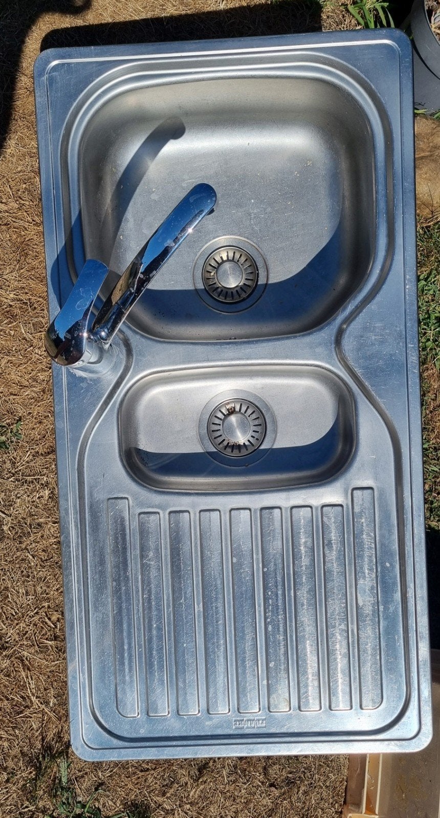 inox spoelbak, Ophalen