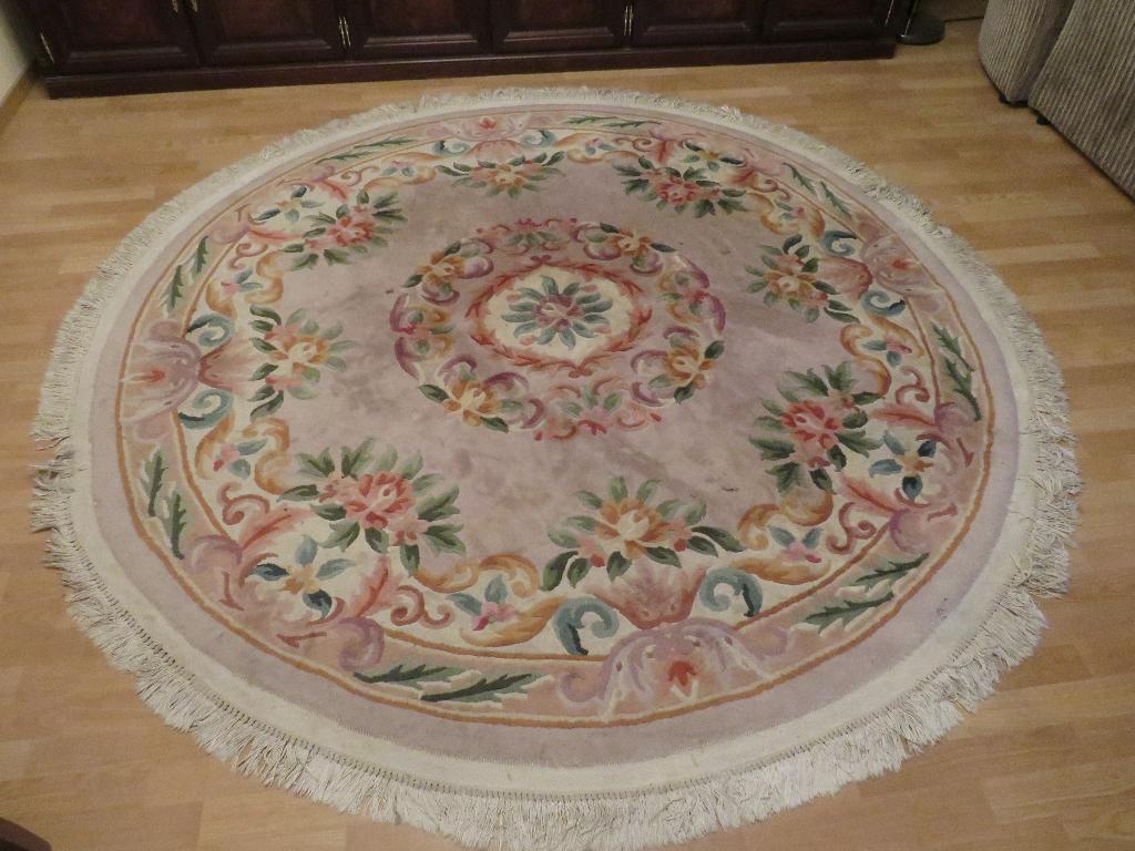 Rond Chinees tapijt, Ophalen, Rond