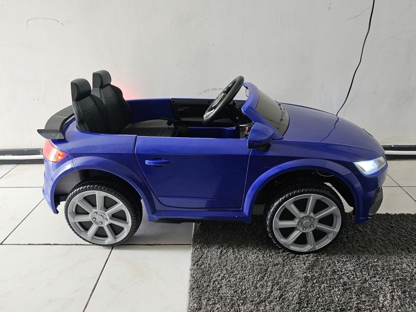 Elektrische kinderauto, Ophalen