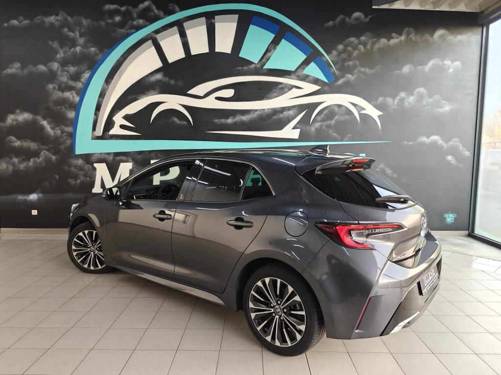 Toyota Corolla 1.8 Hybrid Style + tech pack, Auto's, Toyota, Berline, 5 deurs, Zilver of Grijs, Te koop