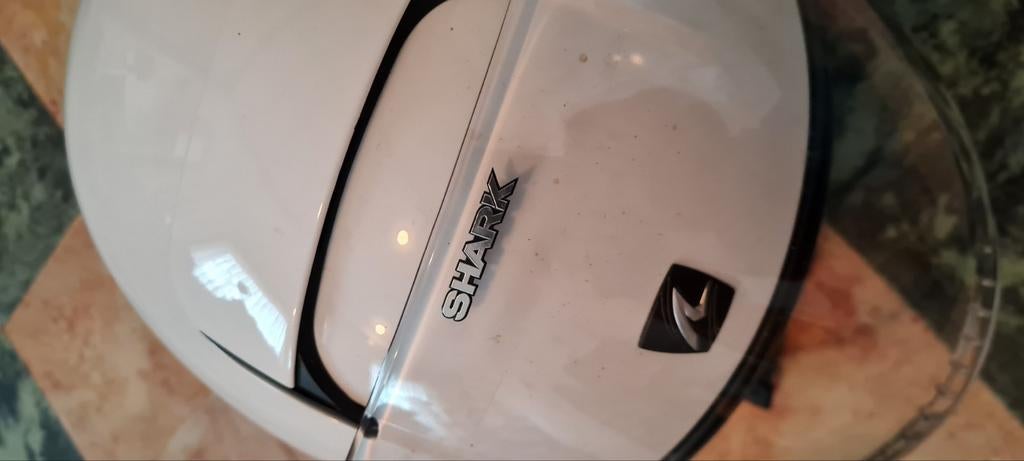 Motorhelm, Ophalen