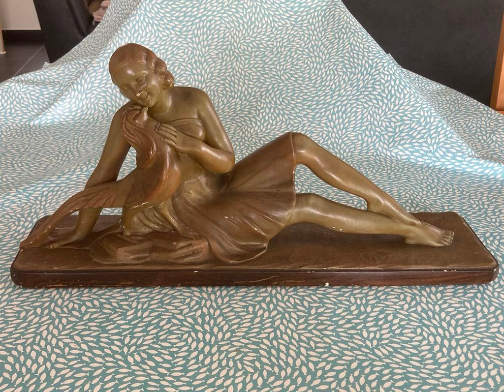 Sculptuur - vrouw met fazant, Ophalen