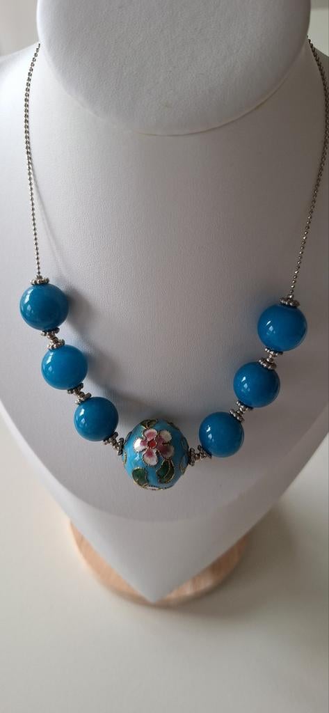 Ketting TITTO, Envoi