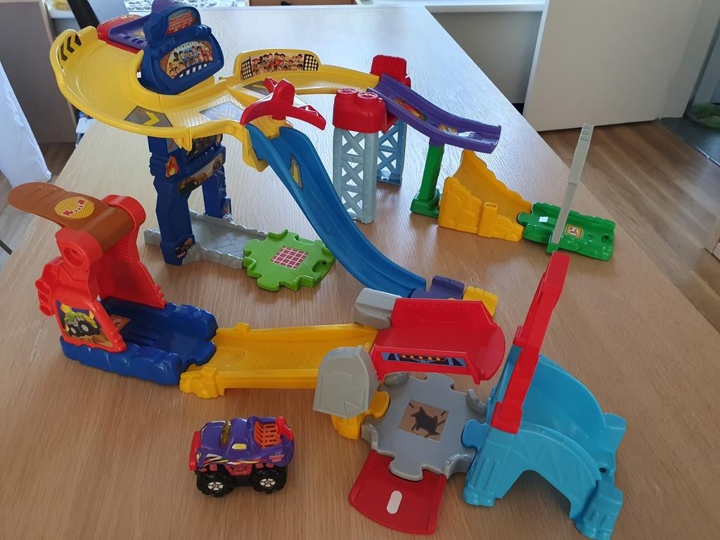 Vtech monstertruck racebaan+ 1 monstertruck autootje, Enlèvement ou Envoi, Utilisé