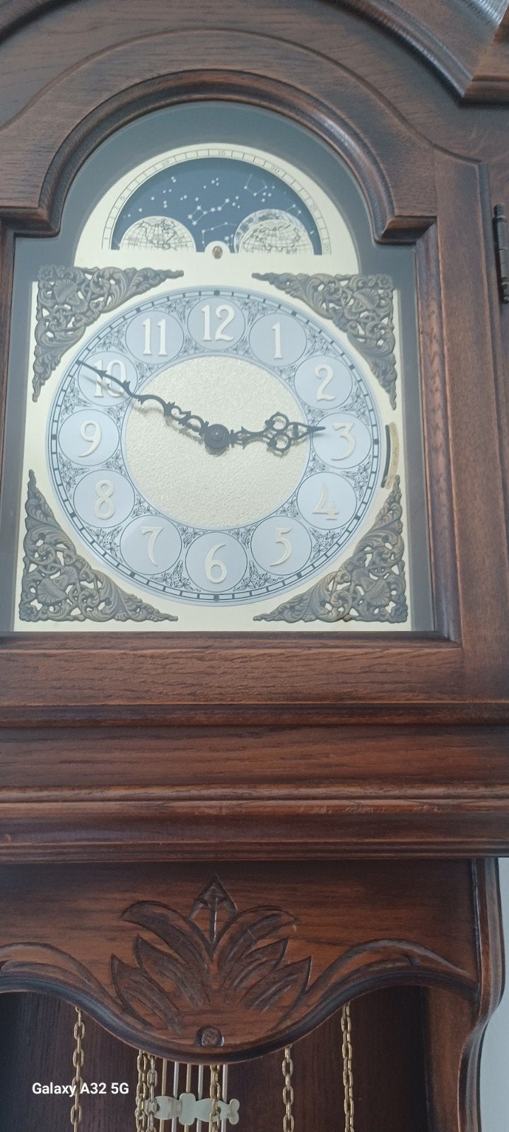 Wandklok met slinger en 3 gewichten, Ophalen