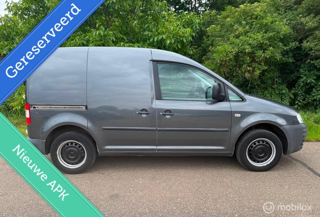 Volkswagen Caddy 2.0 SDI SCHUIFDEUR APK 15/06/27, Stof, Gebruikt, Volkswagen, Wit