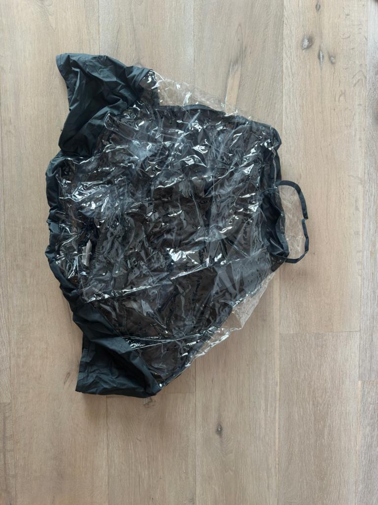 Maxi Cosi regenhoed, Ophalen, Zo goed als nieuw