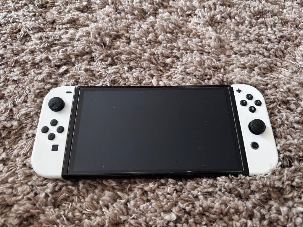 Nintendo Switch OLED, Ophalen of Verzenden, Gebruikt, Met 2 controllers, Switch OLED