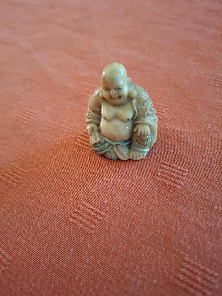 Statuette Bouddha., Enlèvement ou Envoi