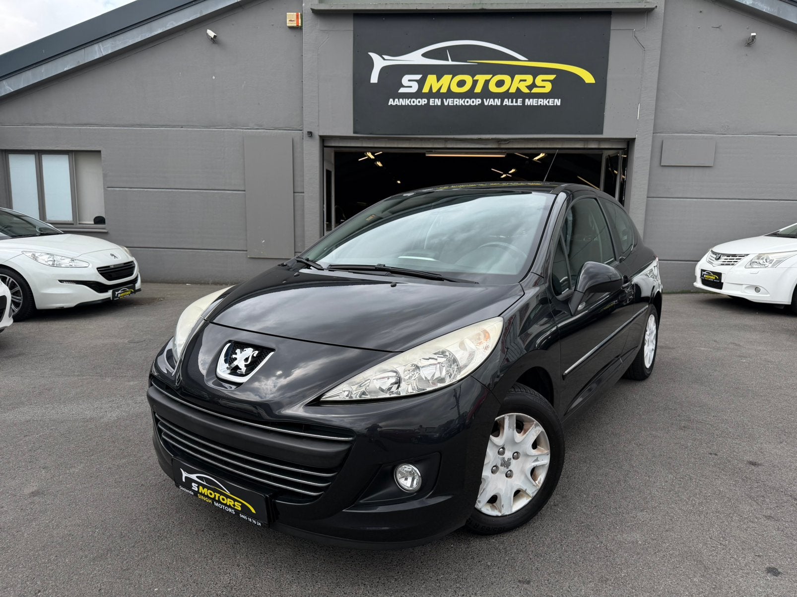 Peugeot 207 1.4i | Airco | Gps | 74.266km | GARANTIE |, Auto's, Euro 5, Stof, Zwart, 1397 cc