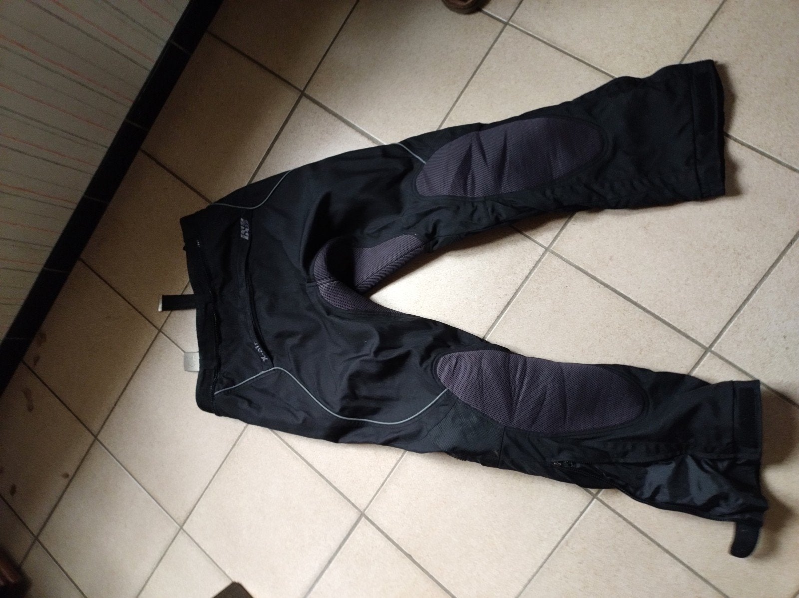 motorbroek, Ophalen