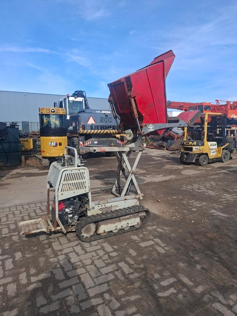 tombereau rotatif sur chenilles, Enlèvement, Dumper